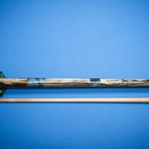 Full view of the handcrafted Pistachio Nut pool cue featuring pistachio wood with stabilized and dyed buck eye Burl